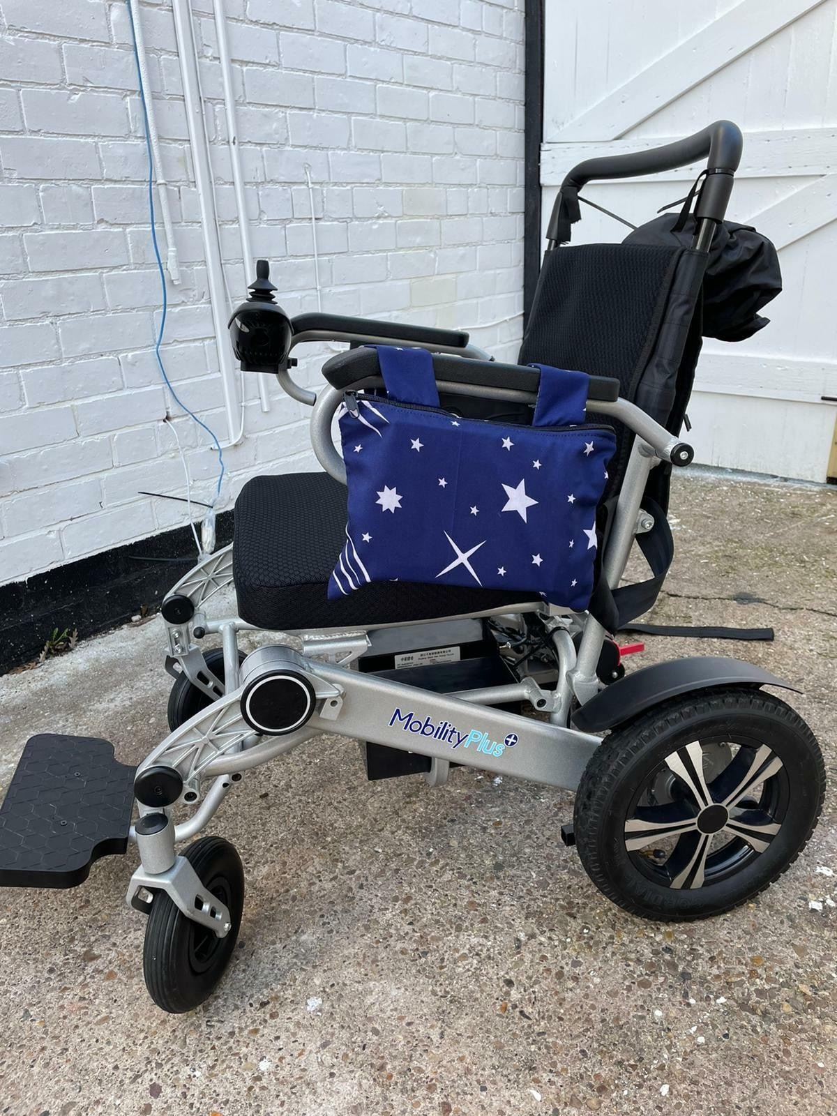 Wheelchair armrest bag