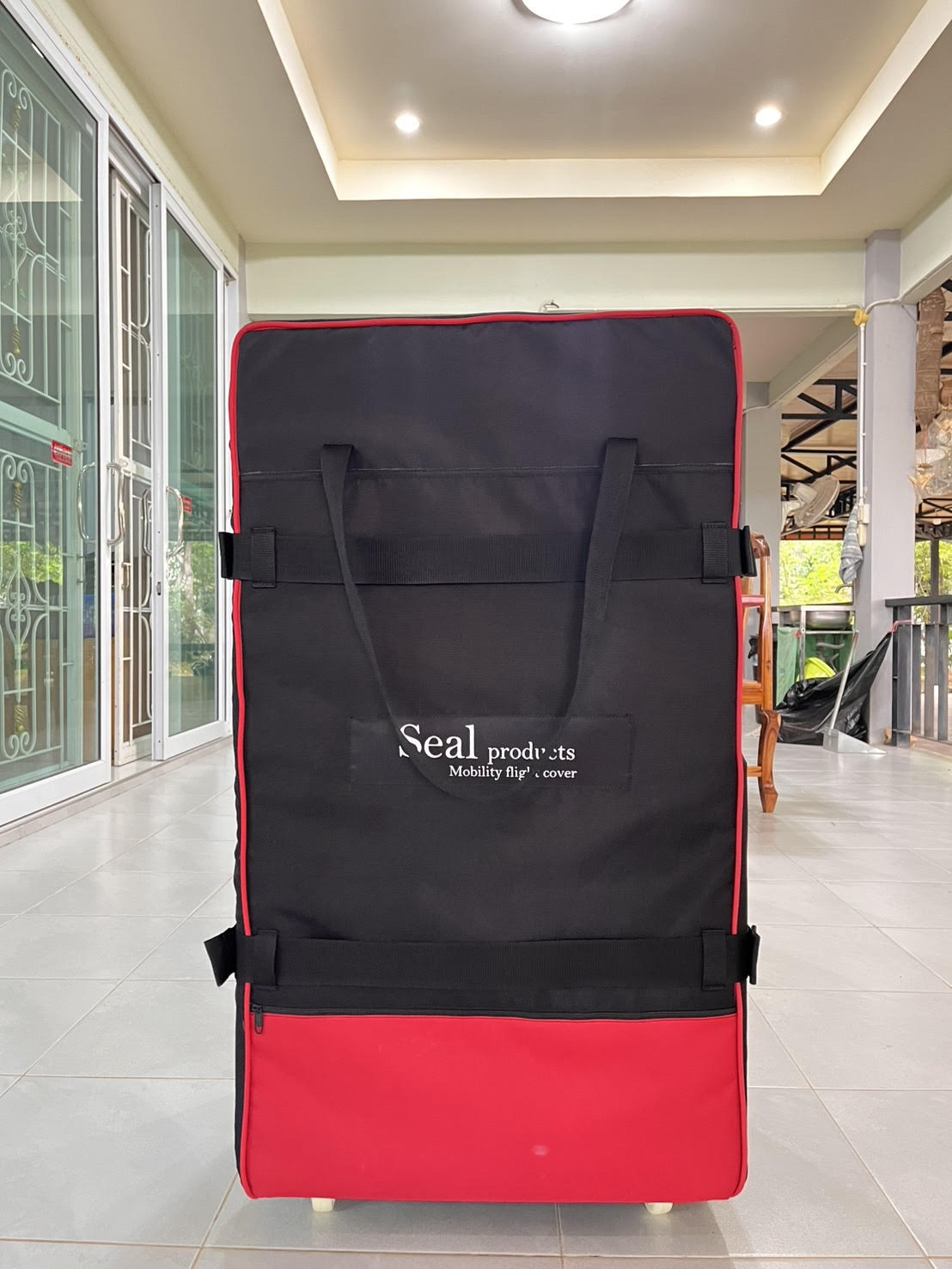 Seal Products Universal Mobility Device Travel Flight Cover, Black with Red Accents, Wheeled Storage Bag for Wheelchairs and Scooters, Protective Transport Case with Interior Dimensions 39" x 18" x 22